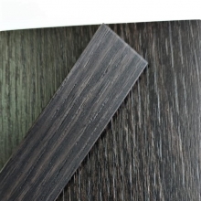 Образец кромки ПВХ Egger Дуб термо чёрно-коричневый (артикул декора H1199 ST12), ширина кромки 19 мм, толщина — 2 мм